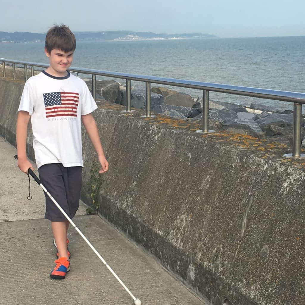 J walking down the beach