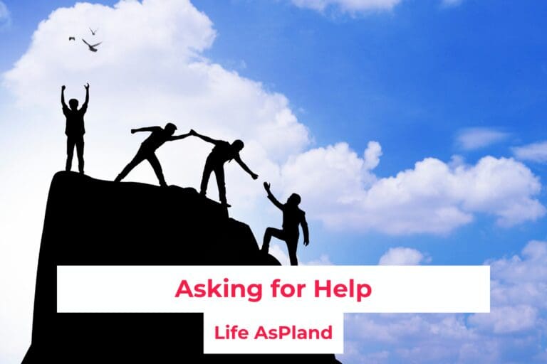 Three silhouettes of people helping each other to climb up a large hill