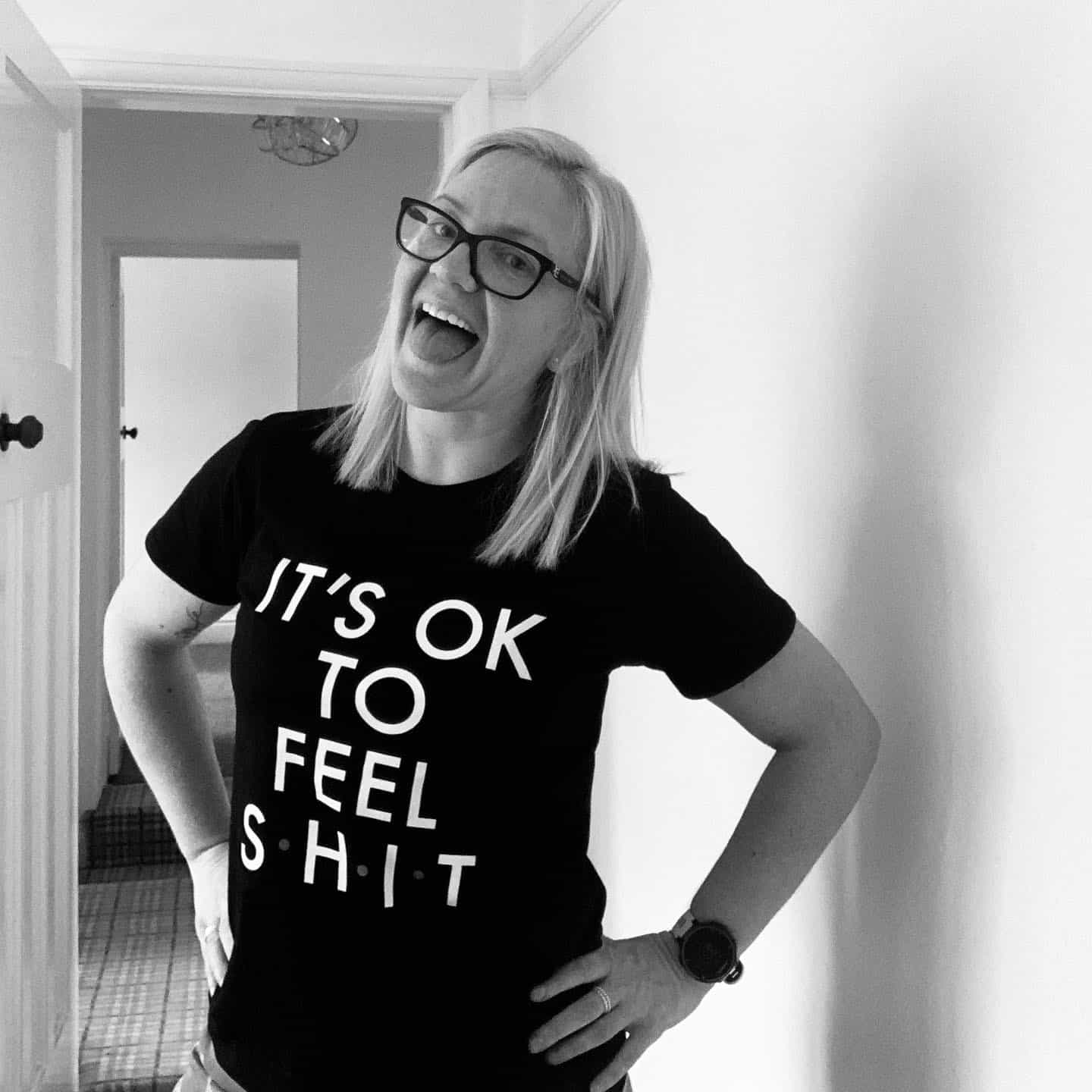 Tina in a t shirt that says it is ok to feel sh*t